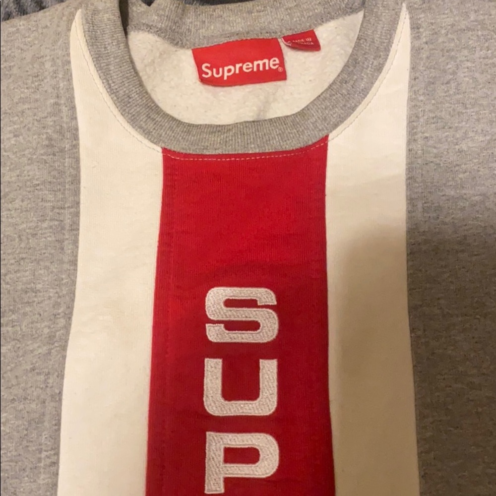 Supreme vertical logo panel